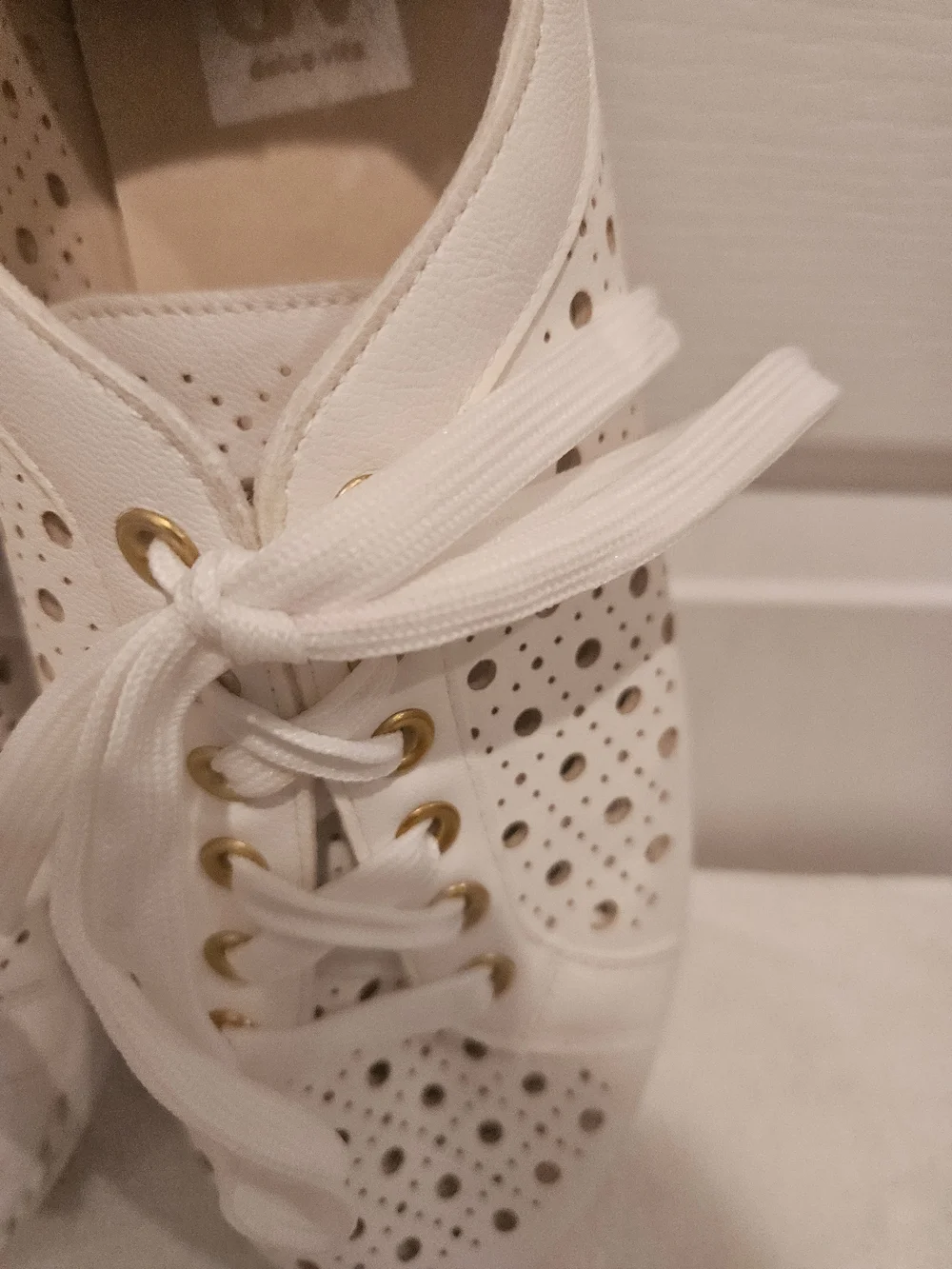 DV by Dolce Vita White Perforated Lace-Up Sneakers with Gold Eyelets
